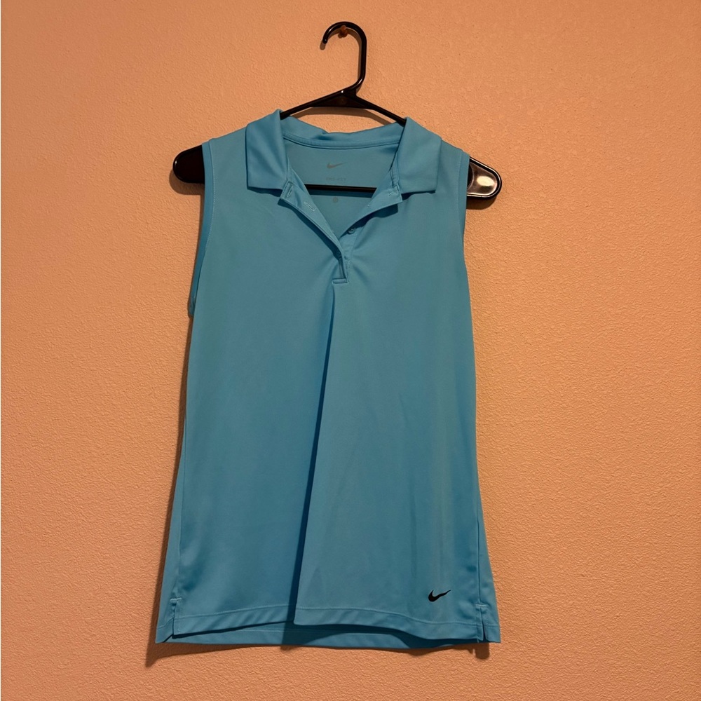 Blue sleeveless golf polo